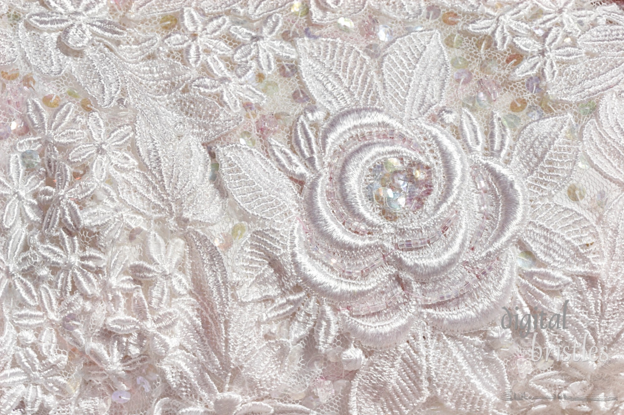 Detail from the embroidered bodice of a wedding dress