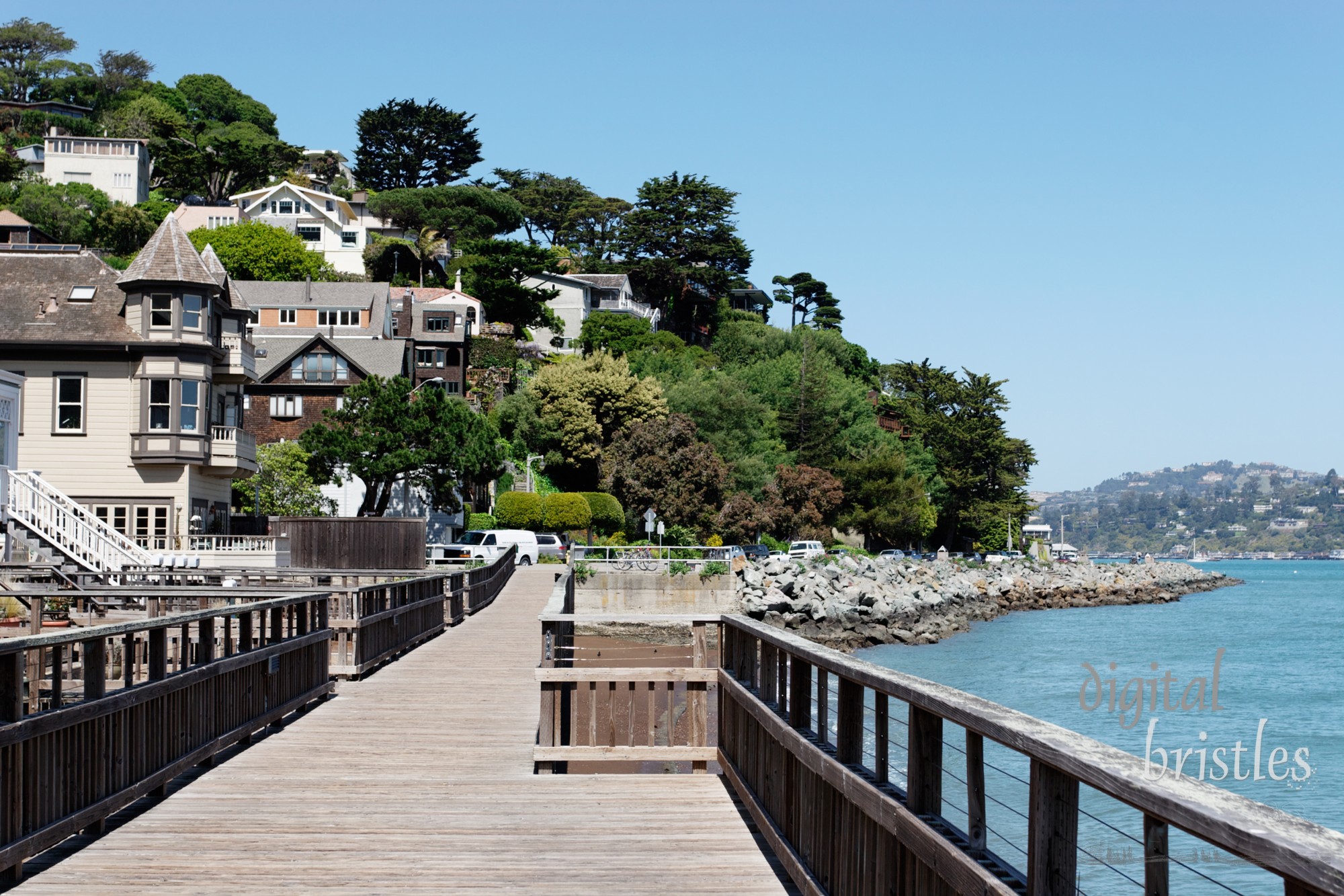 Looking back towards downtown Sausalito from a wooden boardwalk