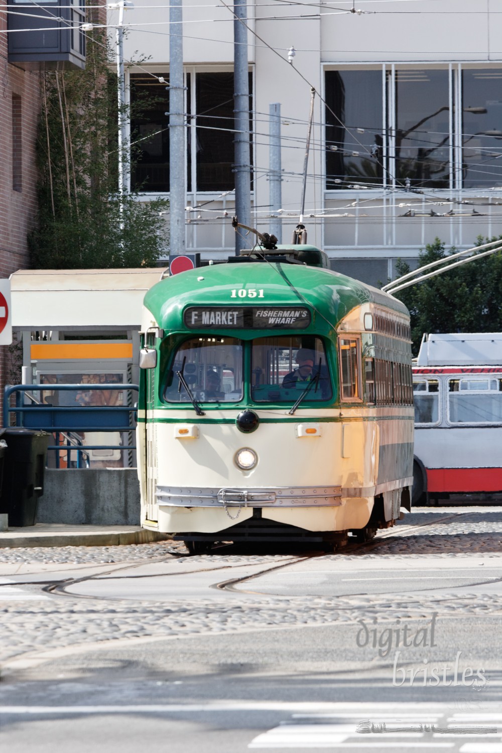 F line streetcar waits to make a turn