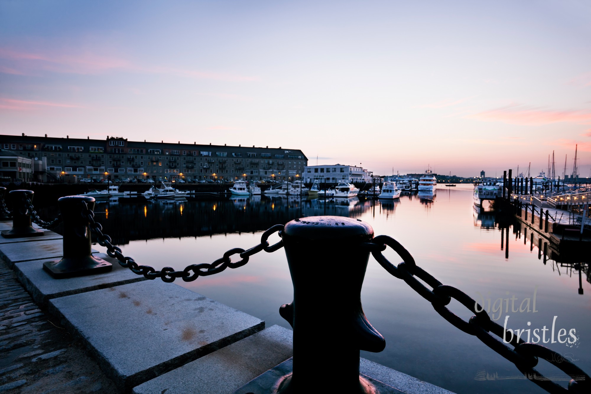 First light on still water at Long Wharf