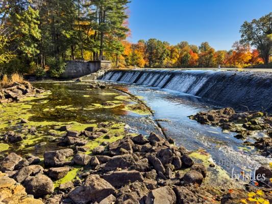 South Natick Dam park on a sunny Autumn afternoon with the Charles River very low after summer drought