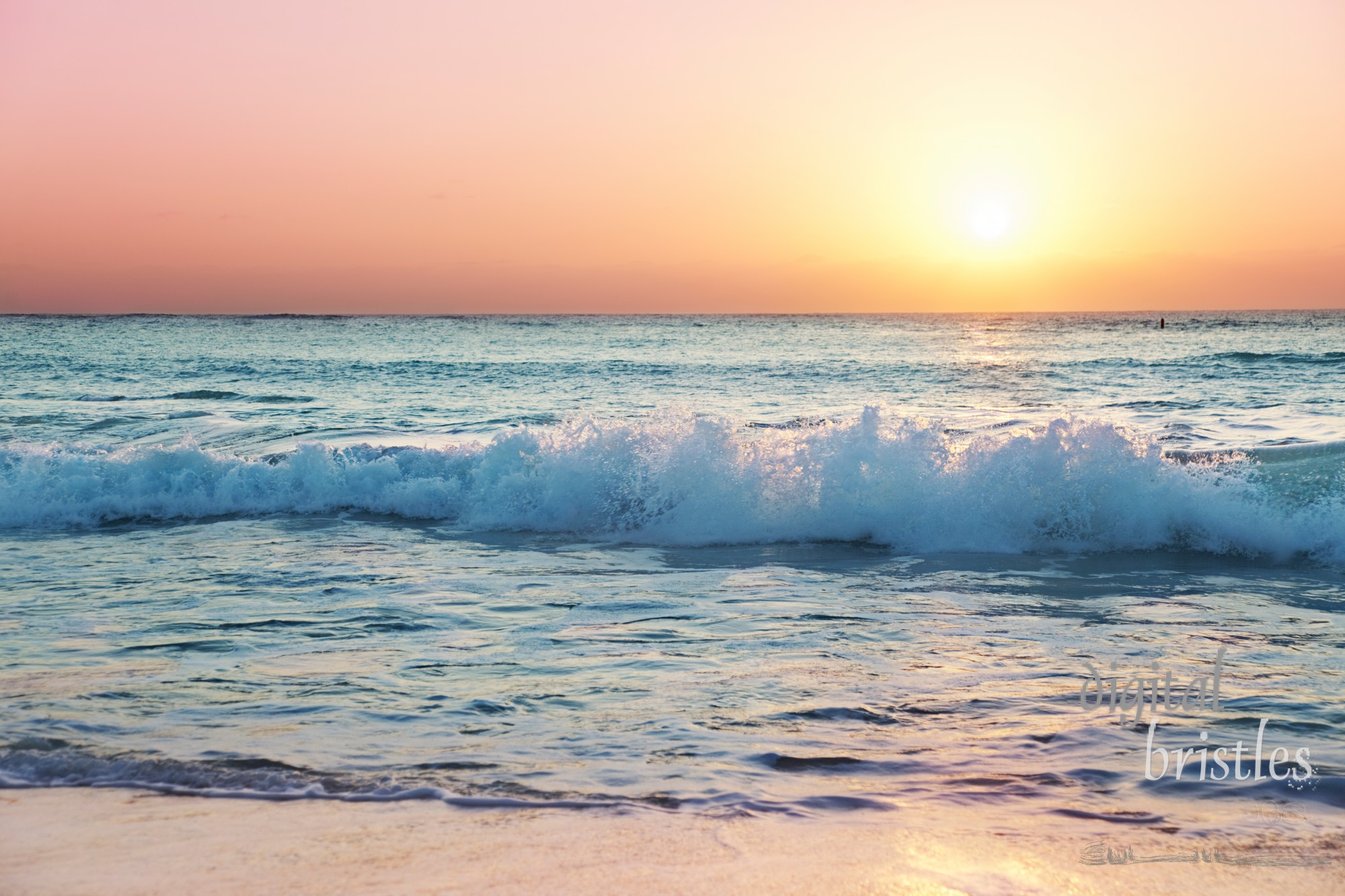 Sunset light catches the top of a wave on Grand Cayman's Seven Mile Beach