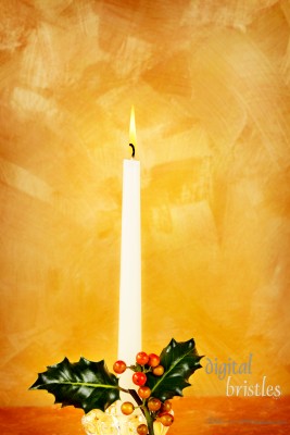 Candle, holly & berries in front of hand painted gold background