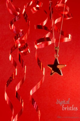 Red light on silver star and streamers