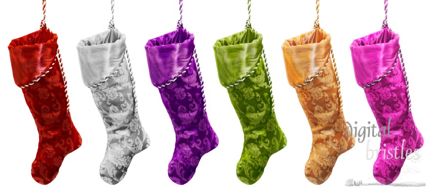 Richly colored Christmas stockings hanging in a row