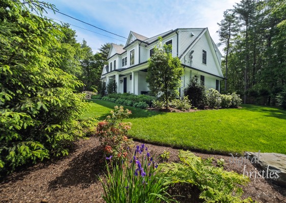 Side front garden of suburban home in Spring