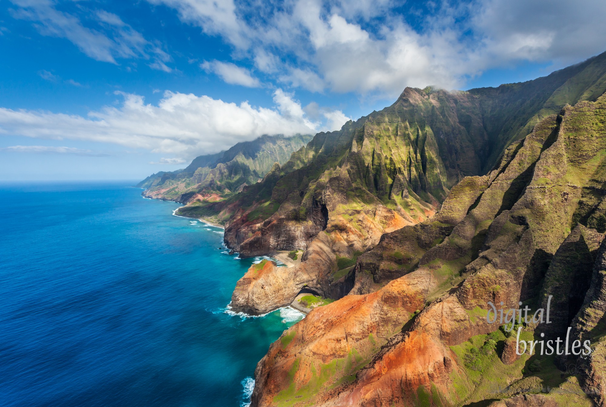 Stone arch on the beach by Honopu Valley, Na Pali State Park, Kauai, Hawaii