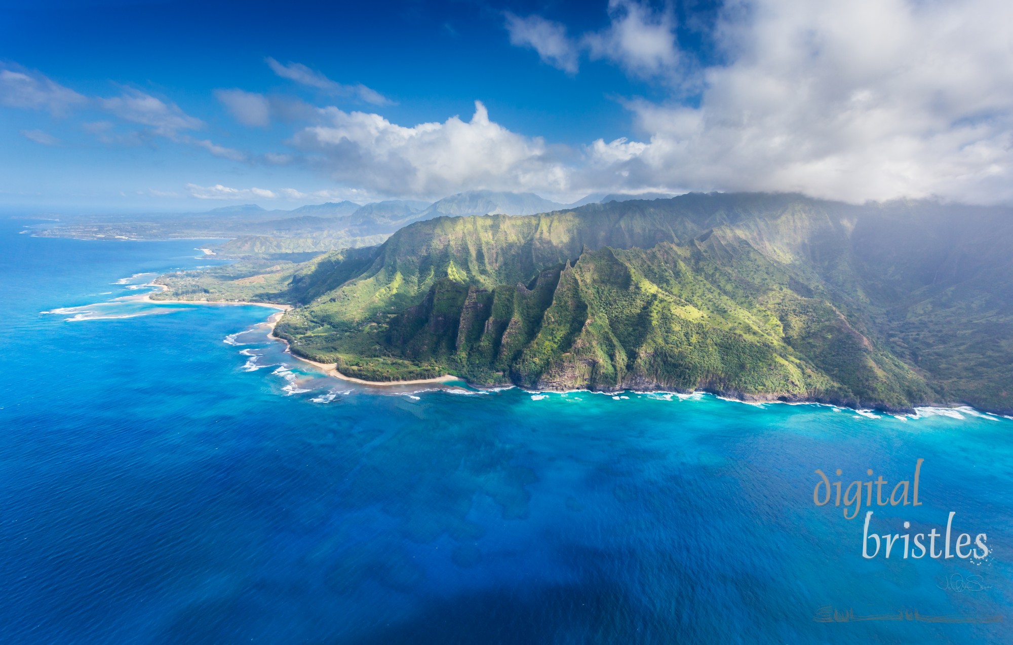 Deeply edtched Na Pali cliffs, Ke'e Beach, Ha'ena Beach State Park, Tunnels Beach leading to Hanalei Bay, Kauai. 