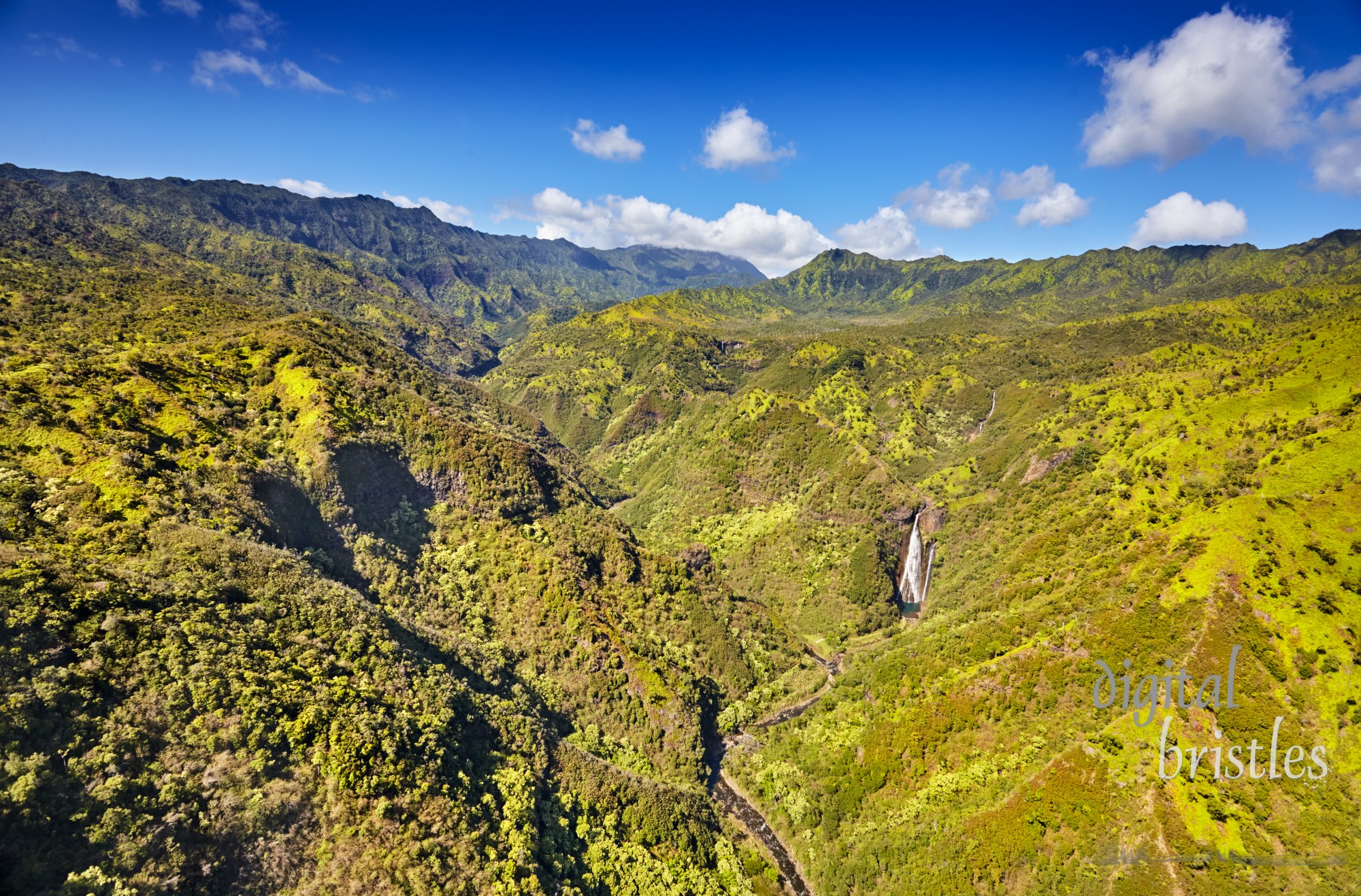 Spectacular erosion by rivers and waterfalls in Kauai's lush, wet interior