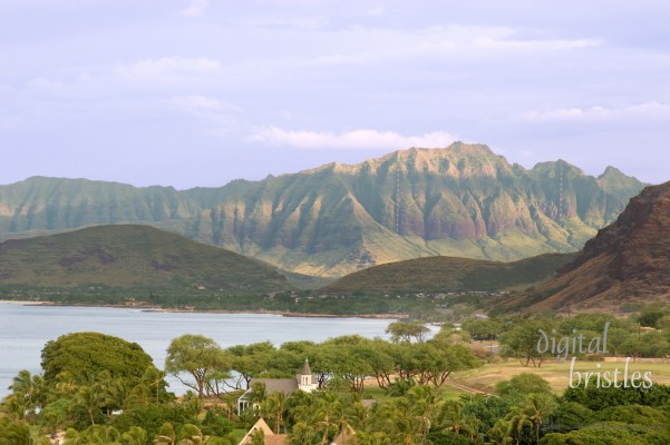 Morning sunlight stripes the mountains