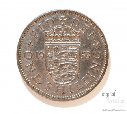 Shilling coin from the UK - English version with 3 lions couchant. With clipping path (excludes shadow)