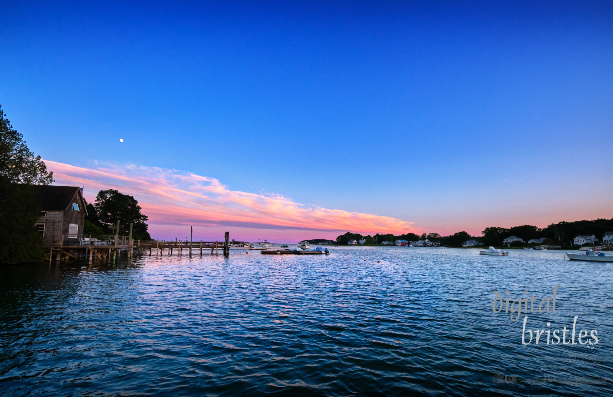 Evening moonrise over the boathouse, Cape Porpoise, Maine