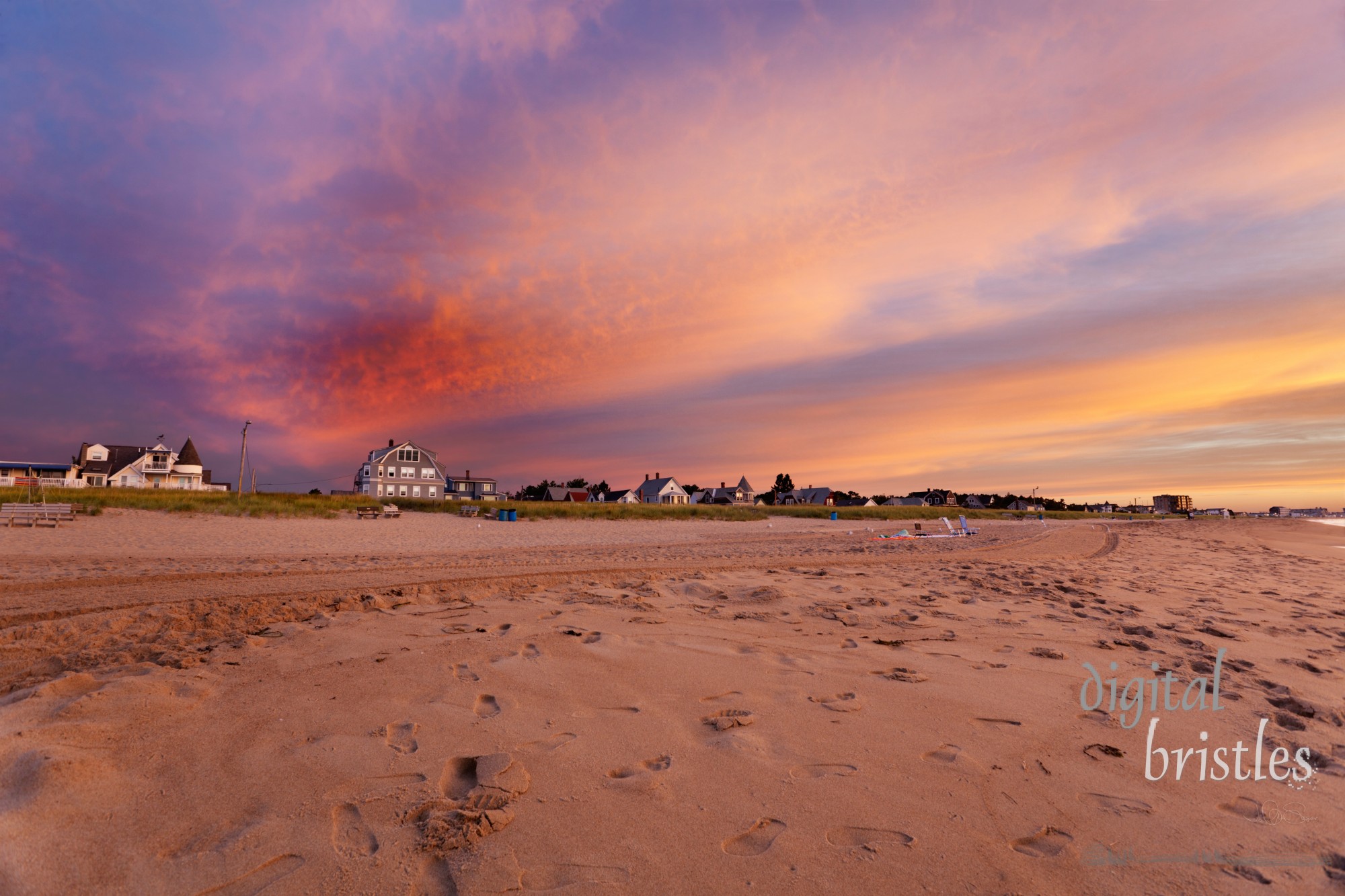 Maine beach houses lit by the pre-dawn vivid light