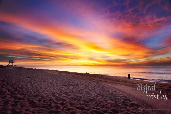 Vivid colors of dawn over the ocean in Maine on a summer morning