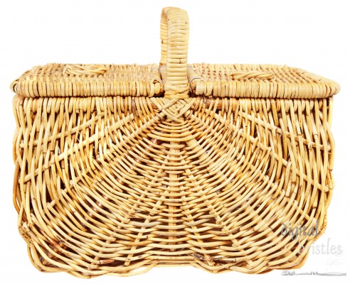 Isolated wicker picnic basket, lid closed