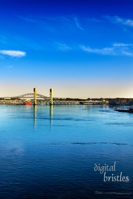 Morning sun hits the Piscataqua River and Sarah M. Long Bridges, connecting Portsmouth, New Hampshire and Maine