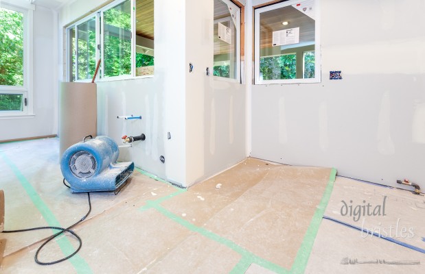 Drywall seams received second layer of 